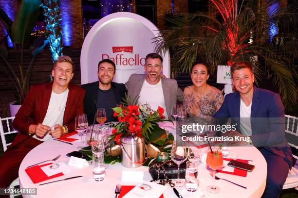 Philipp Isterewicz, Lukas Sauer, Jo Weil, Nina Moghaddam and Dominik Flade during the Raffaello Summer Dinner on August 12, 2021 in Berlin, Germany.