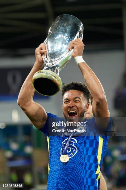 Reece James of Chelsea lifts the trophy after winning with his team the UEFA Super Cup Final match between Chelsea CF and Villarreal CF at Windsor...