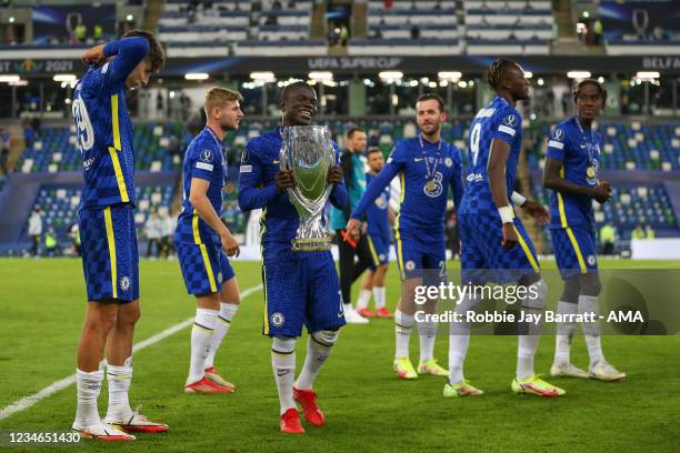 Golo Kante of Chelsea with the trophy during the UEFA Super Cup 2021 Final between Chelsea FC and Villarreal CF at Windsor Park on August 11, 2021 in...