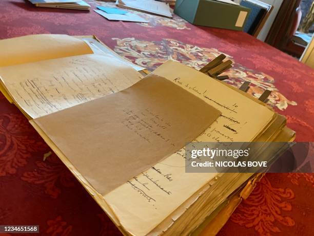 This photograph taken on August 10 shows recently discovered manuscripts of French author Louis-Ferdinand Celine at a lawyers office in Paris. - Some...