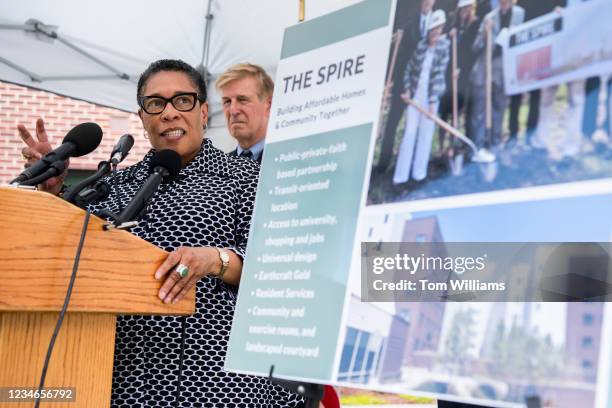 Secretary Marcia Fudge speaks after a tour of The Spire, an affordable apartment community, as Rep. Don Beyer, D-Va., looks on, in Alexandria, Va.,...