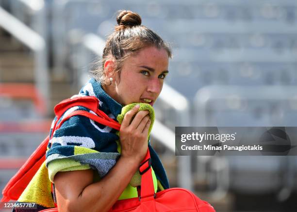 Sara Sorribes Tormo of Spain walks off the court after her loss during her Womens Singles Quarterfinals match against Karolina Pliskova of the Czech...