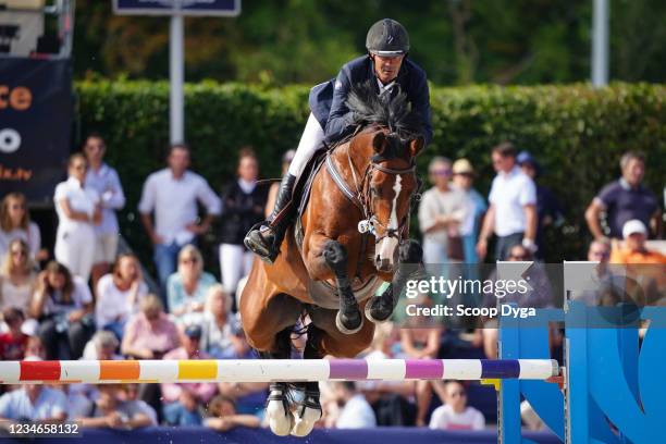 Florian Angot of France riding Chrome d'Ivraie during the Longines Classic Deauville on August 13, 2021 in Deauville, France.