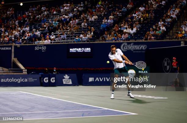 Daniil Medvedev of Russia hits a shot against Hubert Hurkacz of Poland during a quarterfinal match on Day Five of the National Bank Open at Aviva...