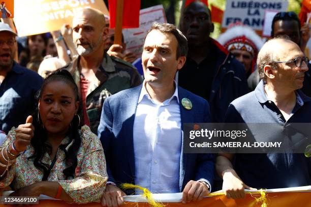 French nationalist party "Les Patriotes" party leader Florian Philippot demonstrates with lawyer for public health Fabrice di Vizio during a national...