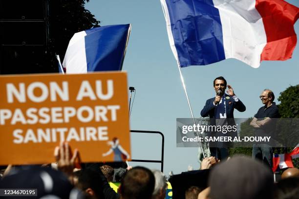 French nationalist party "Les Patriotes" party leader Florian Philippot and lawyer for public health Fabrice di Vizio stand on stage during a...