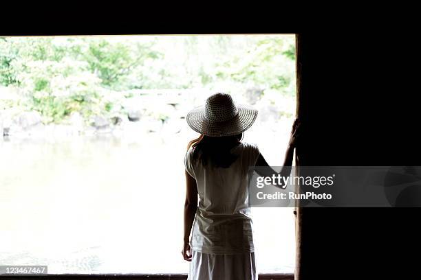 young woman rear view,healthy lifestyle - sun hat stock pictures, royalty-free photos & images