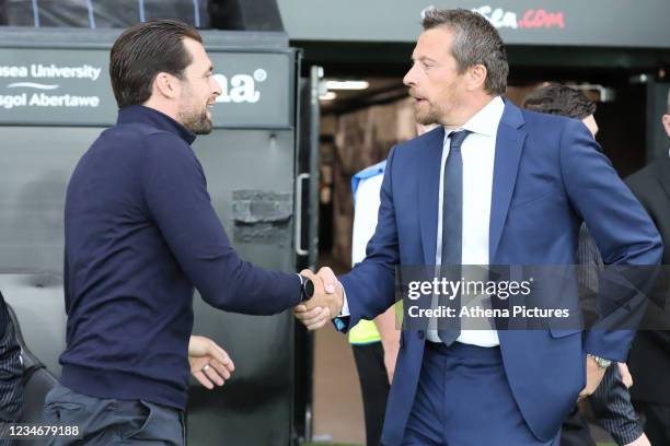 Swansea City manager Russel Martin greets Sheffield United manager Slavisa Jokanovic prior to the Sky Bet Championship match between Swansea City and...