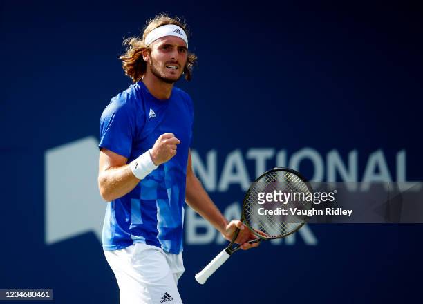 Stefanos Tsitsipas of Greece celebrates a point against Reilly Opelka of the United States during a semifinal match on Day Six of the National Bank...