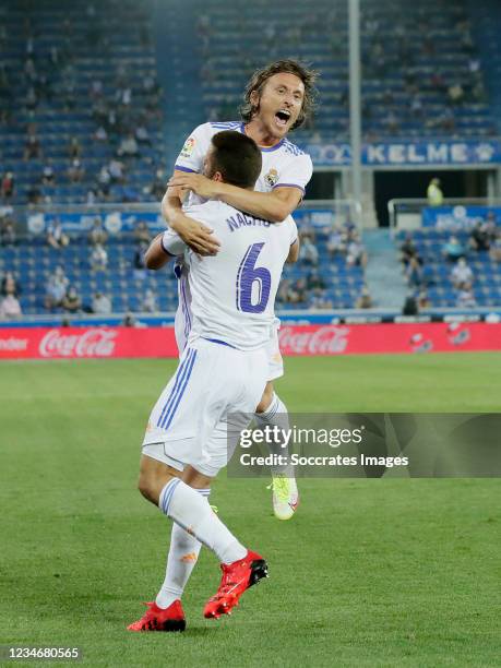 Nacho Fernandez of Real Madrid Celebrates 0-2 with Luka Modric of Real Madrid during the La Liga Santander match between Deportivo Alaves v Real...