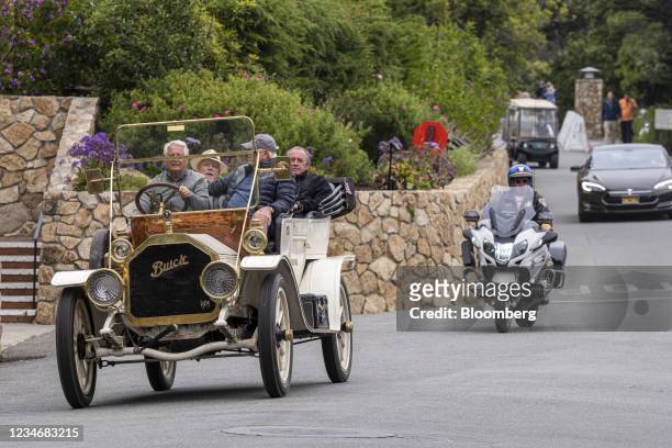 Exhibitors drive in a 1909 Buick at the 2021 Pebble Beach Concours d'Elegance in Pebble Beach, California, U.S., on Saturday, Aug. 14, 2021. Since...