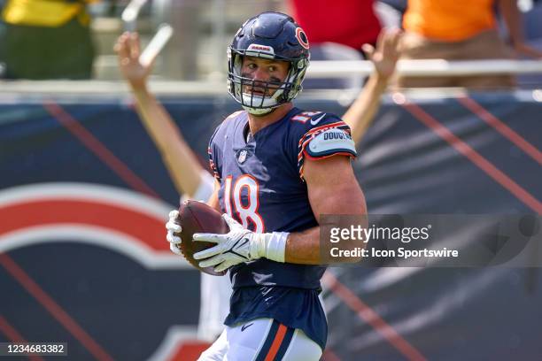 Chicago Bears tight end Jesse James catch a pass from quarterback Justin Fields for a touchdown during a preseason game between the Chicago Bears and...