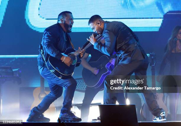 Lenny Santos and Romeo Santos of the group Aventura perform on stage during the Inmortal Tour at Hard Rock Stadium on August 14, 2021 in Miami...