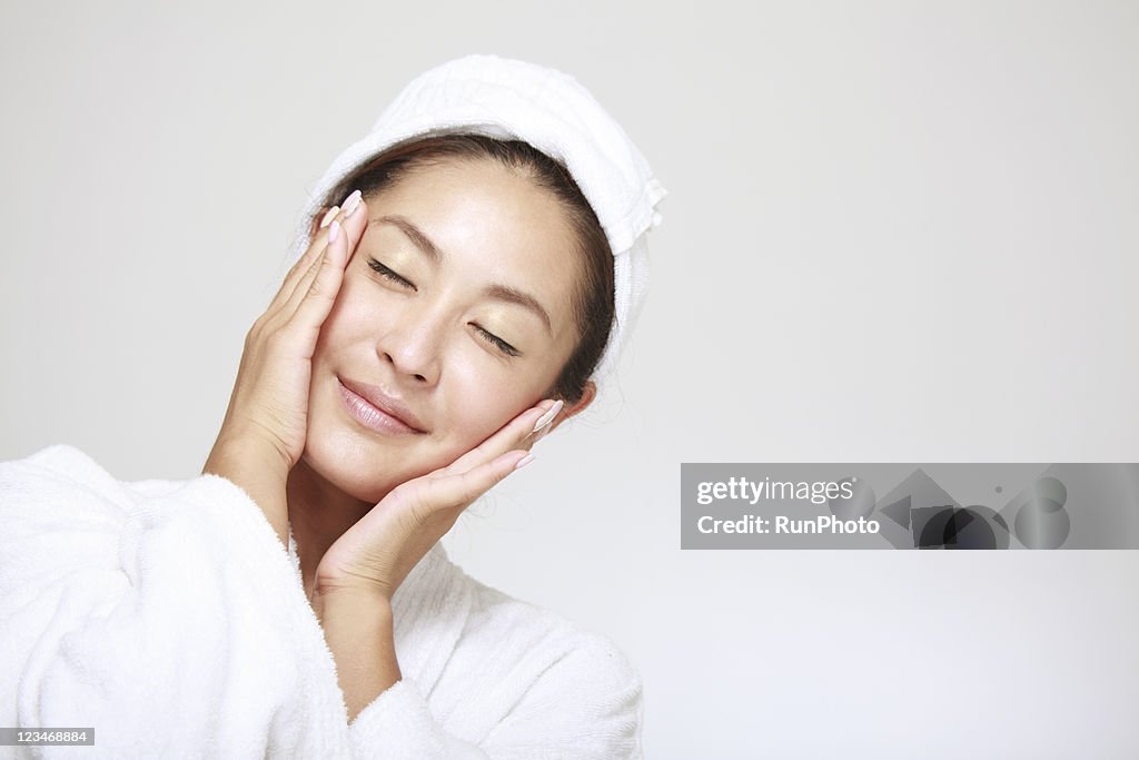 Young woman touching face,skin care