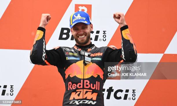 Winner KTM South African rider Brad Binder celebrates on the podium after winning the Austrian Motorcycle Grand Prix at the Red Bull Ring race track...