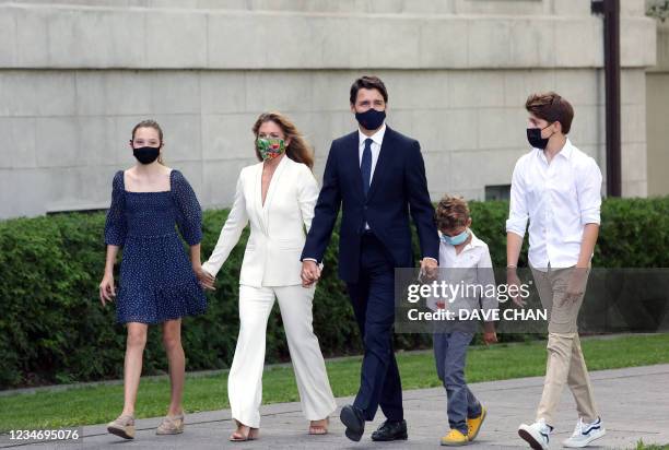 Canada's Prime Minister Justin Trudeau , his wife Sophie Gregoire Trudeau and children Ella-Grace , Hadrien and Xavier arrive at Rideau Hall to ask...