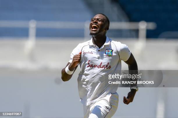 Jayden Seales of West Indies celebrates taking five Pakistan wickets during day 4 of the 1st Test between West Indies and Pakistan at Sabina Park,...