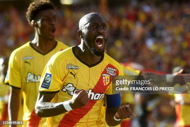 Lens' Ivorian midfielder Seko Fofana celebrates scoring his team's second goal during the French L1 football match between RC Lens and AS...