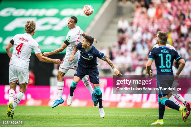 Ellyes Skhiri of Köln and Stefan Jovetic of Berlin in action during the Bundesliga match between 1. FC Köln and Hertha BSC at RheinEnergieStadion on...