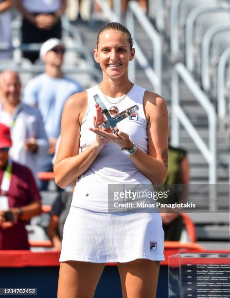 Karolina Pliskova of the Czech Republic poses with the runner up trophy after her loss to Camila Giorgi of Italy during her Womens Singles Final...