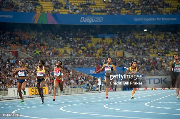 13th IAAF World Championships in Athletics: USA Carmelita Jeter in action during Women's 100M final at Daegu Stadium. Jeter wins gold. Daegu, South...