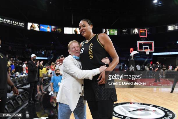 Liz Cambage of the Las Vegas Aces Aces hugs owner, Mark Davis of the Las Vegas Aces after the game against the Washington Mystics on August 15, 2021...
