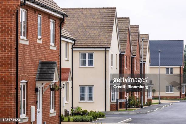 Newly built houses on a Persimmon Plc residential property construction site in Chelmsford, U.K., on Monday, Aug. 16, 2021. Persimmon reports half...