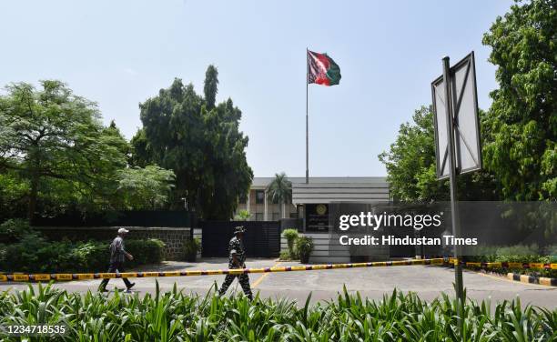 Security personnel deployed at the Afghanistan embassy in Chankyapuri as Taliban have taken control of Afghanistan on August 16, 2021 in New Delhi,...