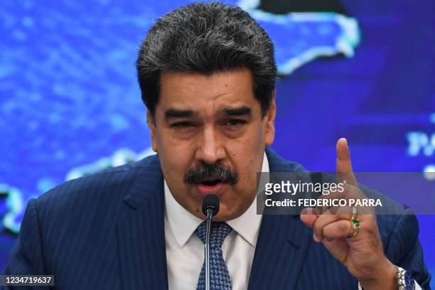 Venezuelan President Nicolas Maduro speaks during a press conference with international media correspondents at the Miraflores Presidential Palace in...