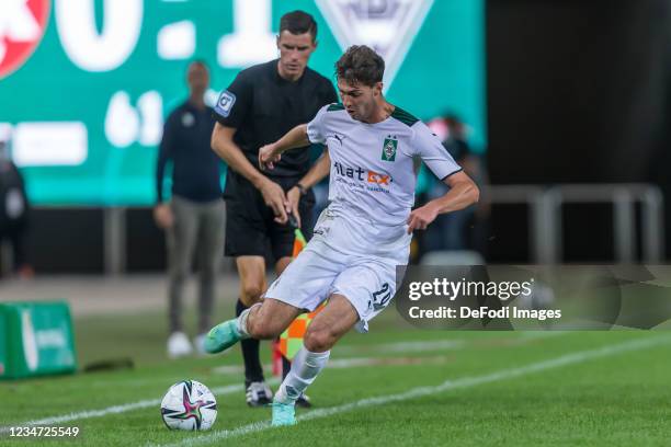 Joseph Michael Scally of Borussia Moenchengladbach controls the Ball during the DFB Cup first round match between 1. FC Kaiserslautern and Bor....