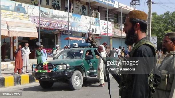 Taliban members patrol the streets of Jalalabad city, Afghanistan on August 17 as the Taliban takes control of Afghanistan after President Ashraf...