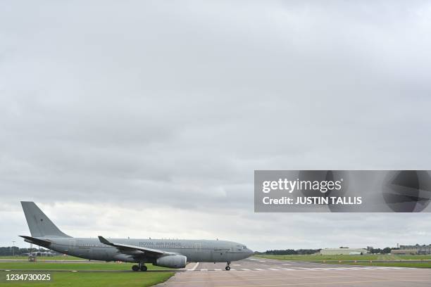 Royal Air Force KC2 Voyager plane taxis before take off at RAF Brize Norton, southern England, on August 17, 2021. - Britain is sending 900 soldiers...