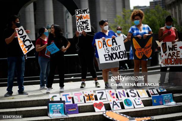 People attend a protest supporting DACA, Deferred Action for Childhood Arrivals, at Foley Square in New York, on August 17, 2021.