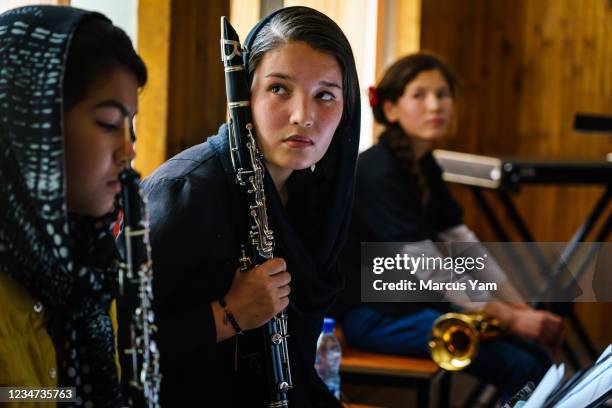 Marina clarinet player, looks aside during the Zohra rehearsal at Afghanistan National Institute of Music, in Kabul, Afghanistan, Tuesday, May 18,...