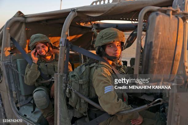 Israeli female soldiers of the 33rd "Caracal" Battalion's infantry unit, patrol along the Israeli Egyptian border near Nitzana in the western Negev...