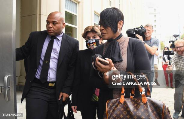 The mother of victim Jocelyn Savage, Jonjelyn Savage arrives with attorney Gloria Allred to attend the trial in the racketeering and sex trafficking...