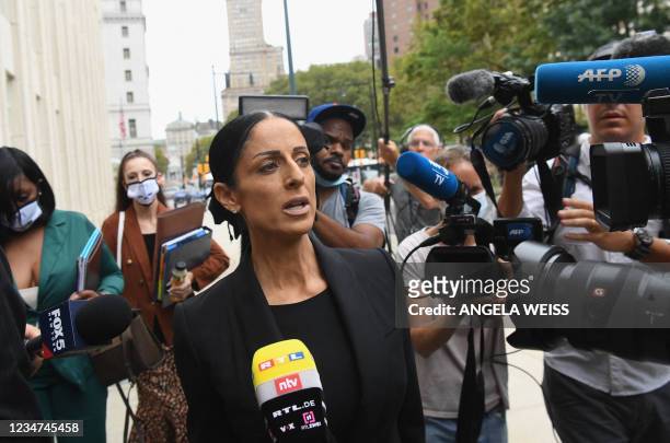 Attorney Nicole Blank Becker speaks to the media as she arrives to attend the trial in the racketeering and sex trafficking case of R. Kelly at...