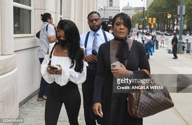 Family members of victim Jocelyn Savage, Timothy Savage, Jonjelyn Savage and their daughter Jailyn Savage arrive to attend the trial in the...