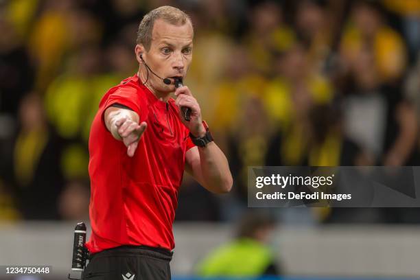 Referee William Collum gestures during the UEFA Champions League Play-Offs Leg One match between BSC Young Boys and Ferencvarosi TC at Stadion...