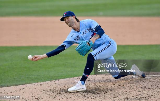 Toronto Blue Jays pitcher Adam Cimber throws a pitch with a submarine style delivery during the Toronto Blue Jays versus Washington Nationals MLB...