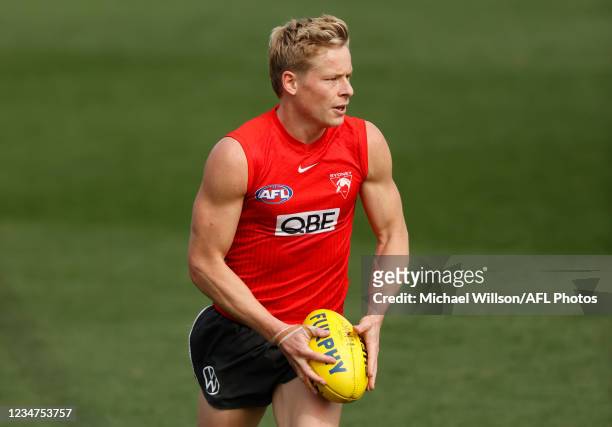 Isaac Heeney in action during the Sydney Swans training session at North Port Oval on August 19, 2021 in Melbourne, Australia.