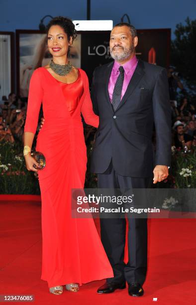 Actor Laurence Fishburne and Gina Torres attends the "Contagion" premiere during the 68th Venice Film Festival at Palazzo del Cinema on September 3,...