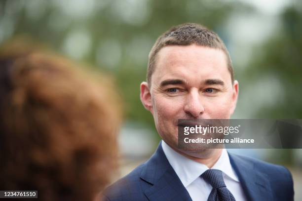 August 2021, Schleswig-Holstein, Rendsburg: Lars Windhorst, entrepreneur and chairman of Tennor Holding, comes to a press briefing after the takeover...
