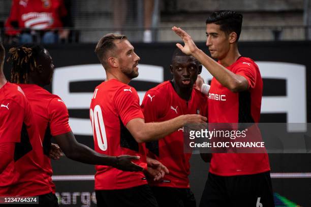 Rennes' Moroccan defender Nayef Aguerd celebrates after scoring during the Conference Europa league football match between Rennes and Rosenborg at...