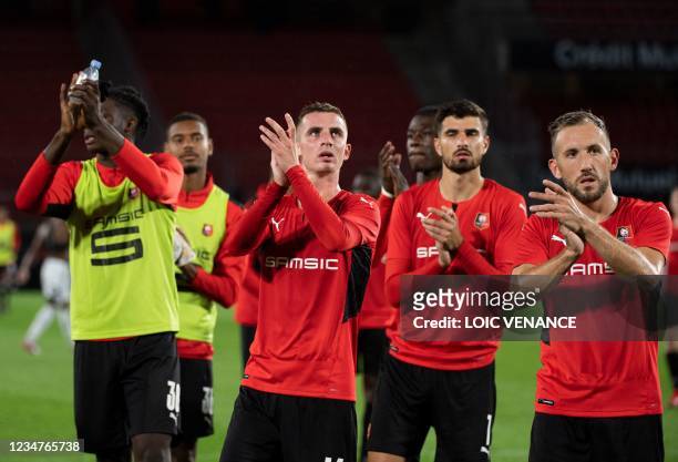 Rennes' players celebrate after winning in the Conference Europa league football match between Rennes and Rosenborg at the Rohazon Park Stadium in...