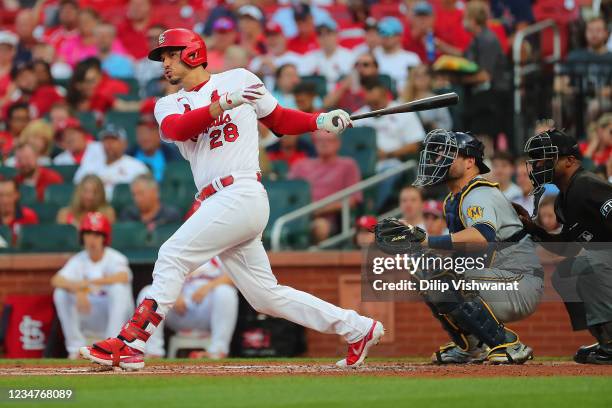 Nolan Arenado of the St. Louis Cardinals bats in a run with a double against the Milwaukee Brewers in the first inning at Busch Stadium on August 19,...