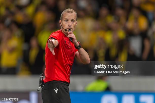 Referee William Collum gestures during the UEFA Champions League Play-Offs Leg One match between BSC Young Boys and Ferencvarosi TC at Stadion...