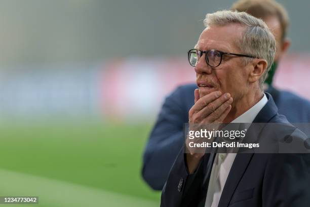 Head coach Peter Stoeger of Ferencvarosi TC gestures prior to the UEFA Champions League Play-Offs Leg One match between BSC Young Boys and...