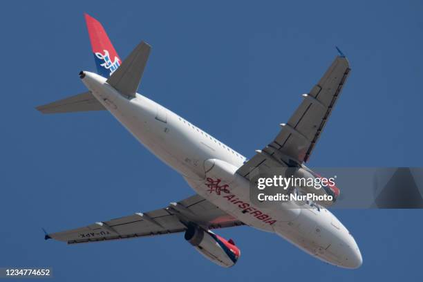 An Air Serbia Airbus A319 aircraft of the Serbian flag carrier with registration YU-APK as seen landing at Thessaloniki International Airport...