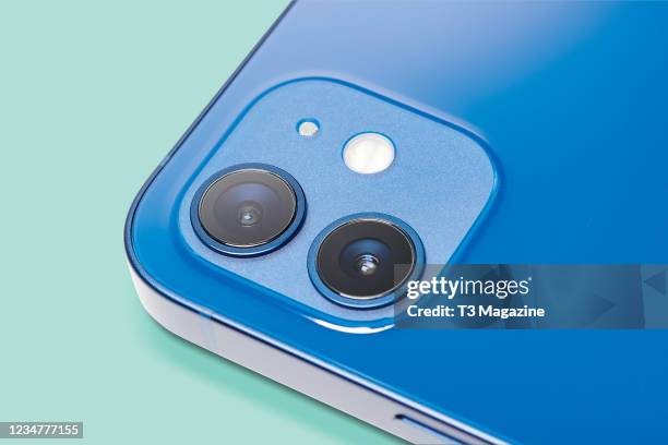Detail of the camera lenses on an Apple iPhone 12 with a Blue finish, taken on October 28, 2020.